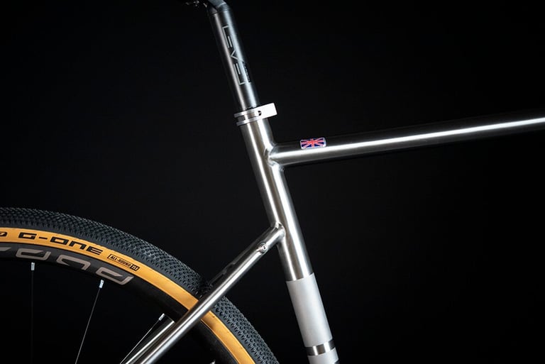 Ribble CGR Ti titanium seat tube and top tube junction with a Union flag badge and dropped seatstay.