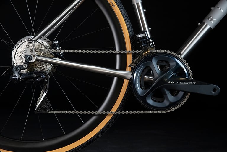 Ribble CGR Ti drivetrain close-up with Shimano Ultegra crankset, rear derailleur and titanium chainstay.