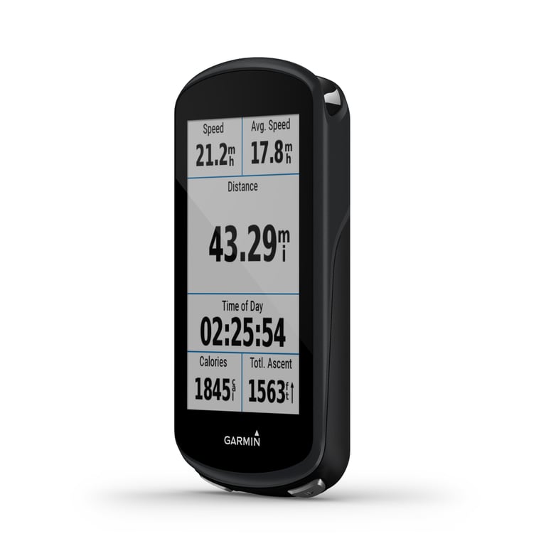 Garmin Edge 1030 Plus at an angle, its screen showing speed, distance, time of day, calories and total ascent.