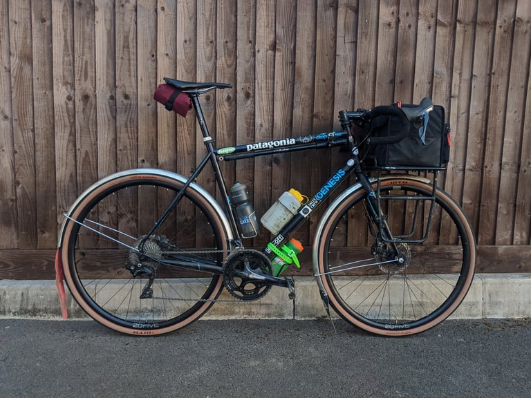 John's black Genesis with mudguards, front rack bag and saddle pack, loaded for the Bristol Dirty Kanzelled.