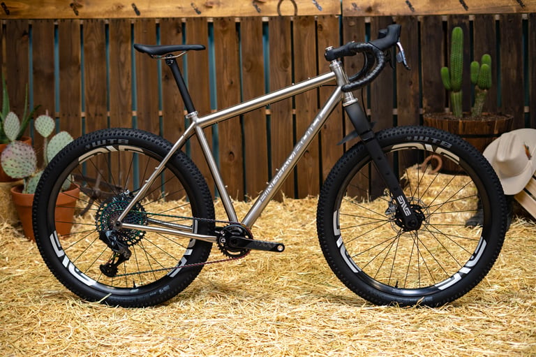 Bingham Built Adventure titanium bikepacking bike on 27.5 Plus tyres with ENVE wheels and fork at the Builder Round-Up.