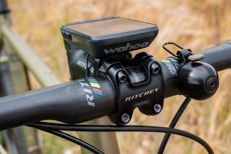 Ritchey WCS C220 stem with a Wahoo computer mounted above it and a Spurcycle bell on the Bombtrack Hook EXT's bar.