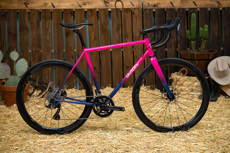 SaltAir All-Road steel bike with pink-to-blue fade paint and ENVE carbon wheels at the ENVE Builder Round-Up.