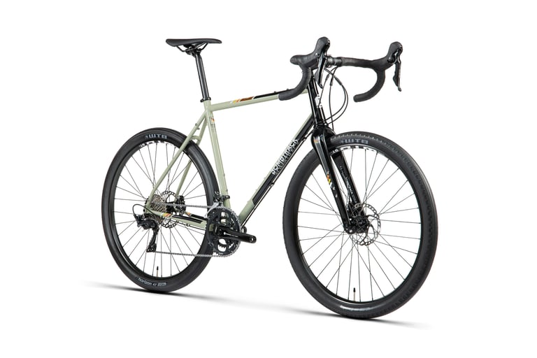 Bombtrack 2021 Audax in glossy sage green and black with 650b WTB tyres and a 2x drivetrain, studio shot.