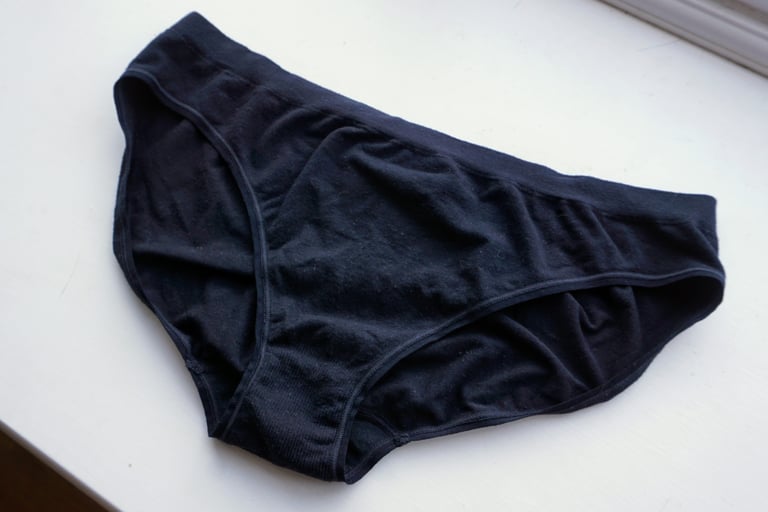 BAM Bamboo Seamless Briefs in black, laid flat on a white surface.