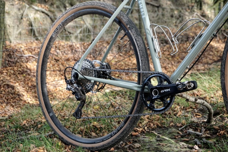 Shimano GRX chainset and rear mech on the Temple Adventure Disc 1, with a Hunt wheel and steel frame.