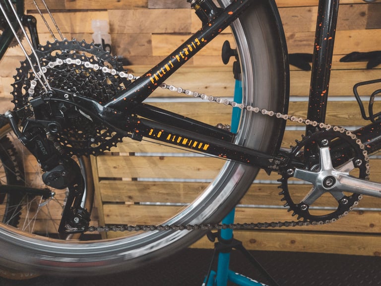 Close-up of the Cannondale's 1x9 drivetrain, with an 11-46 cassette and 42T chainring, for basket Everesting.