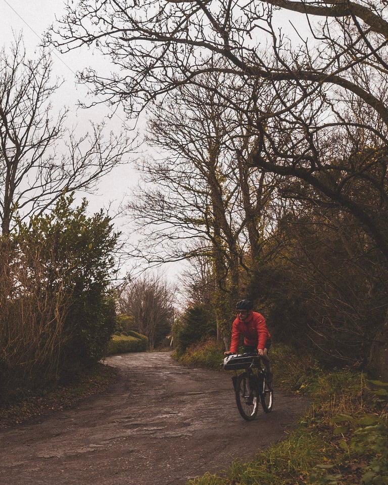 Joel Jones rides his basket bike up Oldfield Drive in Heswall, the Wirral climb chosen for his basket Everesting.