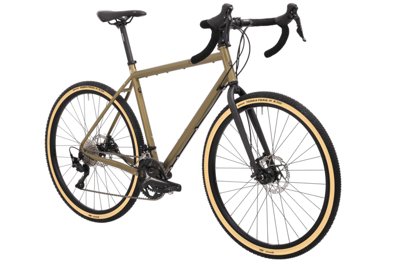 Tout Terrain Vasco Select 21.1 in olive green with a steel fork and tan-wall tyres, front three-quarter view.