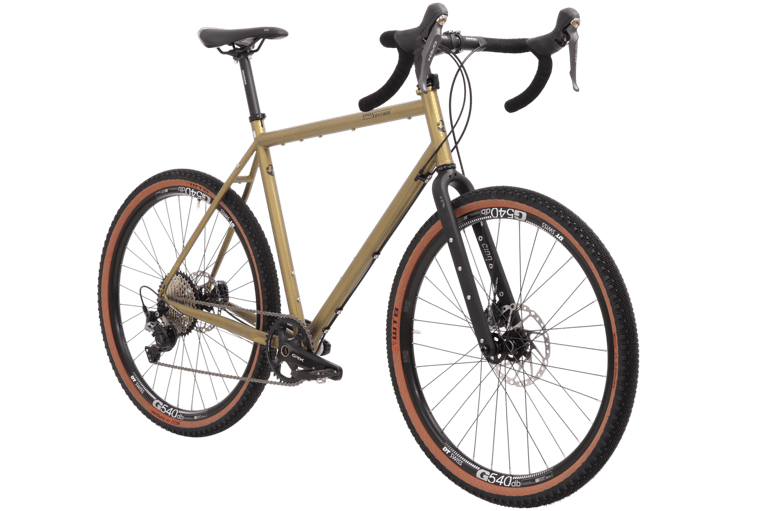 Tout Terrain Vasco Select 21.3 with carbon Cinq Touring fork and GRX 1X drivetrain, front three-quarter view.