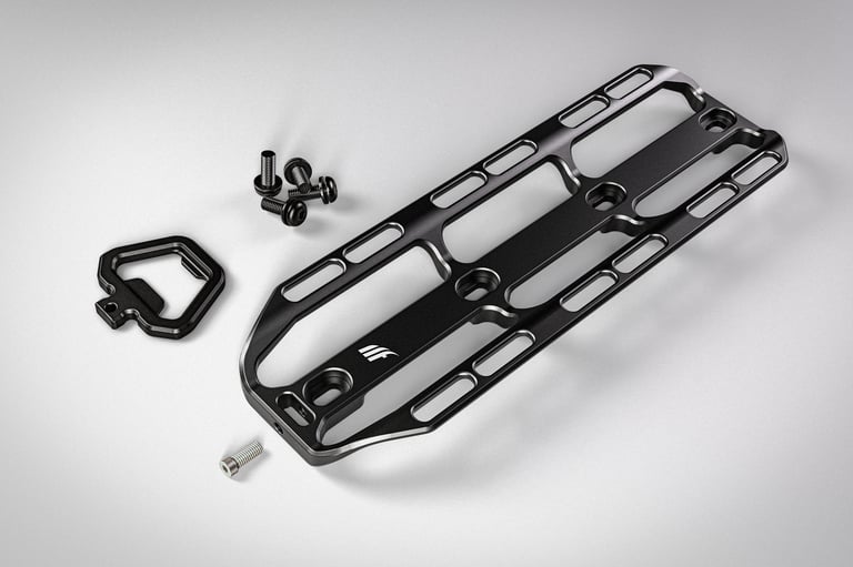 Render of the Tailfin Cargo Cage in black with its removable Load Chip shelf and bolts shown beside the cradle.