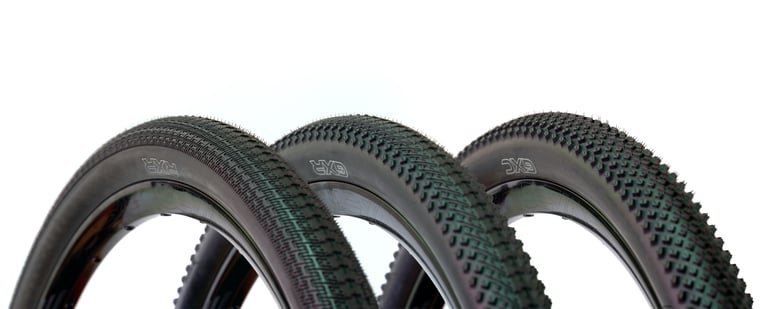 The three new Halo gravel tyres side by side on white: RXR, GXR and GXC, from smooth to aggressive tread.