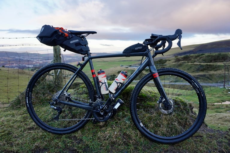 Trek Checkpoint gravel bike with Ortlieb seat pack, top-tube bag and two bottles, set up for the Festive 500.