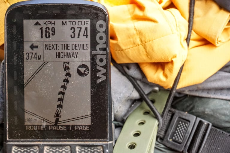 Wahoo ELEMNT ROAM turn-by-turn screen showing the next cue, The Devils Highway, 374 metres ahead.