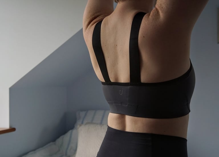 Back of the Velocio LUXE bra, with two wide parallel shoulder straps and the small logo on the rear panel.