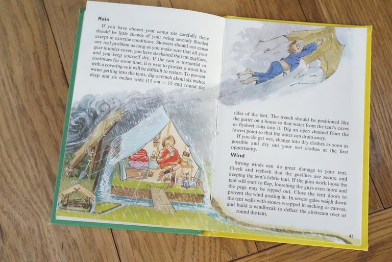 Ladybird camping book spread on rain and wind, with an illustrated tent in a downpour and a camper blown away.