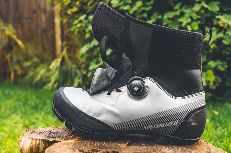Specialized Defroster boot with the top flap folded back, showing the tongue and BOA lacing.