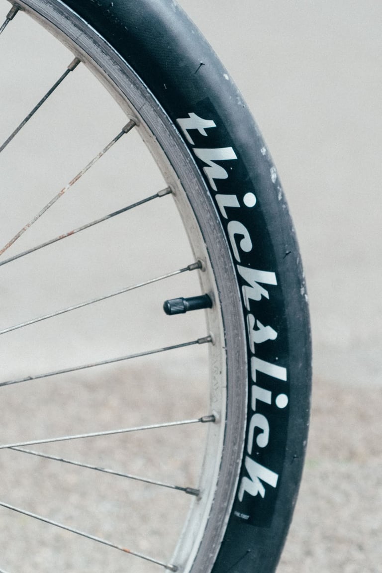 WTB Thickslick slick tyre fitted to a 26-inch wheel on a vintage mountain bike, close up.