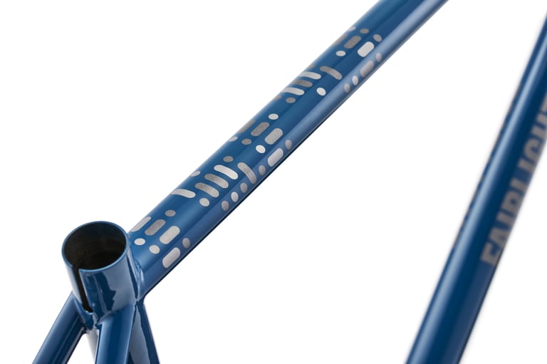 Fairlight Faran 2 frame in Midnight Blue with a silver Morse-style pattern on the top tube, on white.
