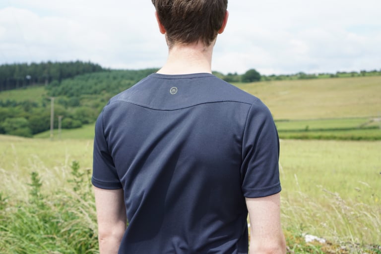 Back of the Chapeau Dry Tech Tee, plain apart from a small round logo below the collar.