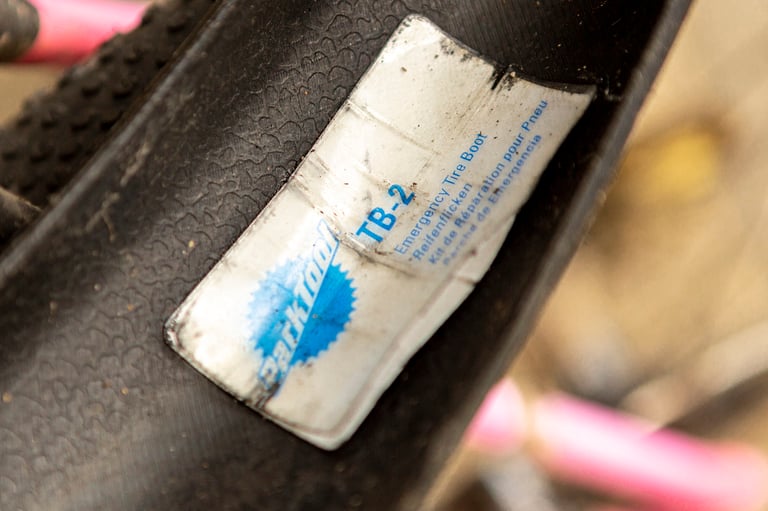 Park Tool TB-2 emergency tyre boot stuck inside a Maxxis Receptor tyre to cover the puncture.