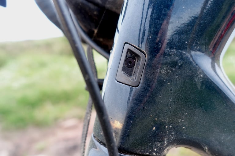 Internal cable entry port on the frame of the Giant Revolt Advanced Pro 0, close up.