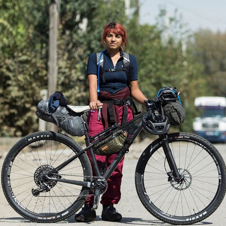 Vedangi Kulkarni with her loaded mountain bike before the 2019 Silk Road Mountain Race in Kyrgyzstan.