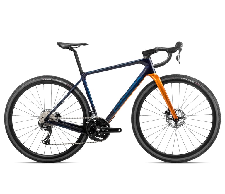 Orbea Terra M20 Team in blue with an orange fork and Shimano GRX 2x groupset, side view.