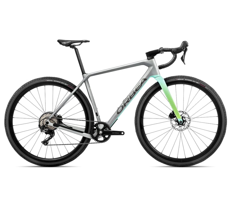 Orbea Terra M30 Team 1X in silver and mint green, with Shimano GRX 1x drivetrain, side view.