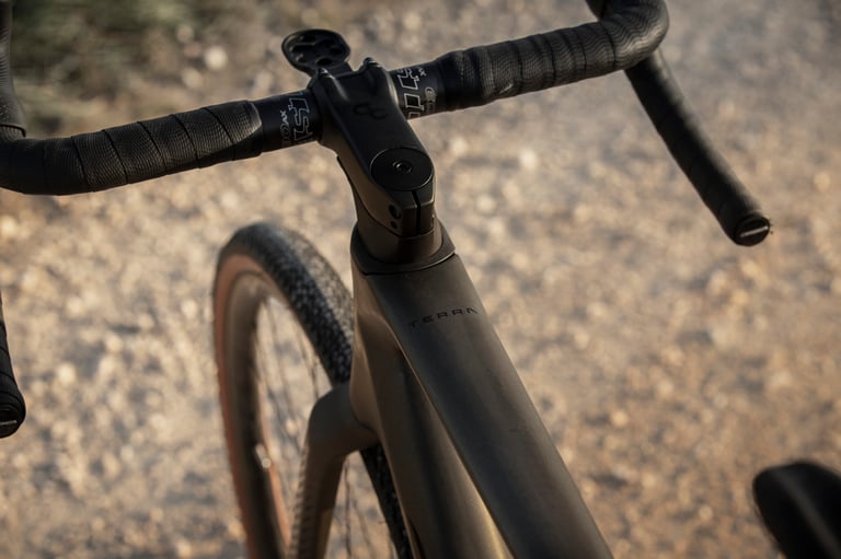 Orbea Terra cockpit from above, with flared handlebar, stem and computer mount over the head tube.