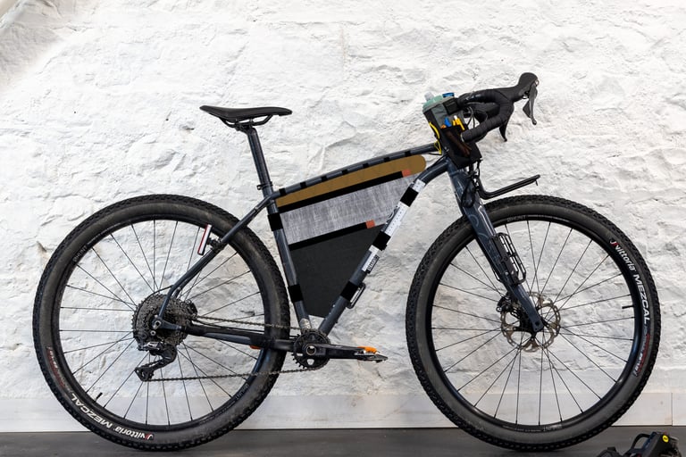 Mock-up of the StraightCut frame bag on the Mason ISO, with a mustard top panel and grey and black panels below.