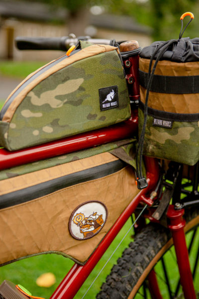 Earthy and camo tones of wizard works bags on a clandestine build at bespoked